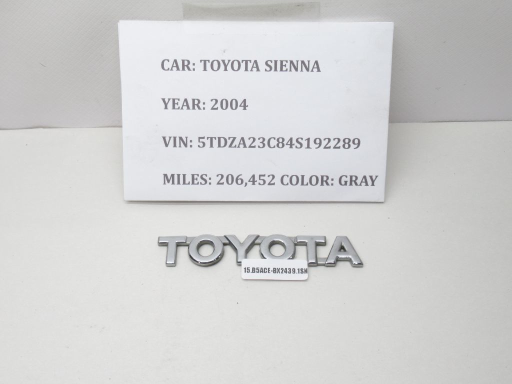 2004-2006 Toyota Sienna  Rear Door Script Nameplate Badge 75444-08010 OEM