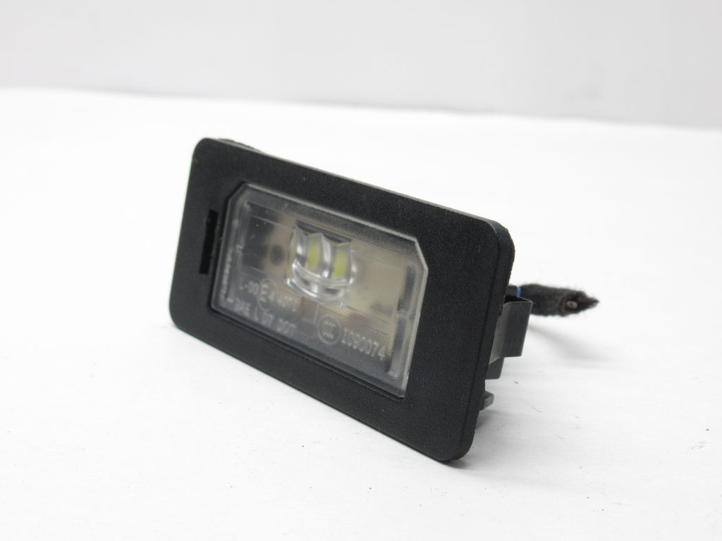 2013-2015 BMW X1 Rear License Plate Light Lamp  7193293  OEM