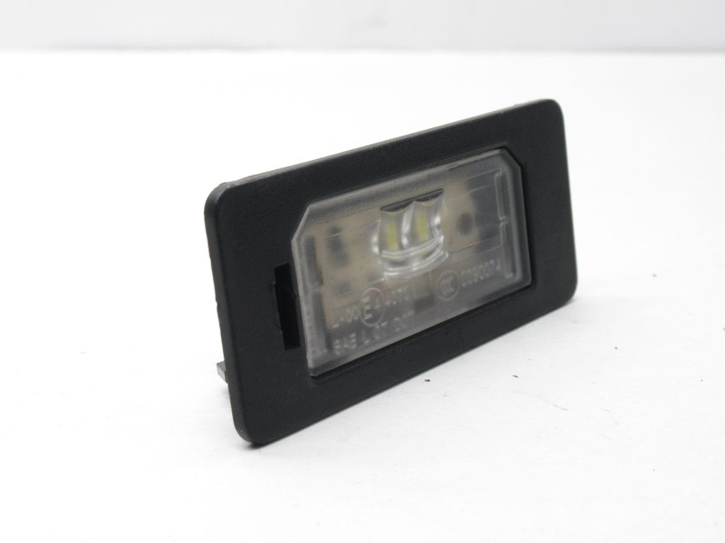 2013-2015 BMW X1 Rear License Plate Light Lamp  7193293  OEM