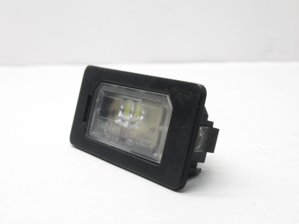 2013-2015 BMW X1 Rear License Plate Light Lamp  7193293  OEM