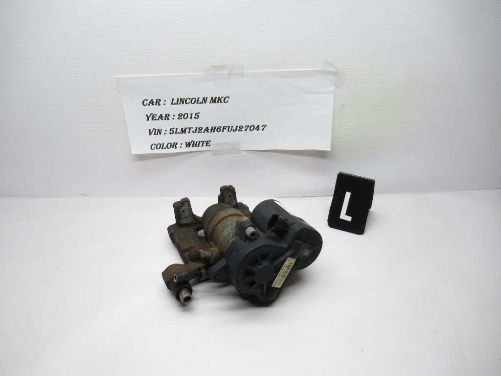 2015-2019 Lincoln MKC Rear Left Driver Side Brake Caliper DG9C-2D251-J OEM